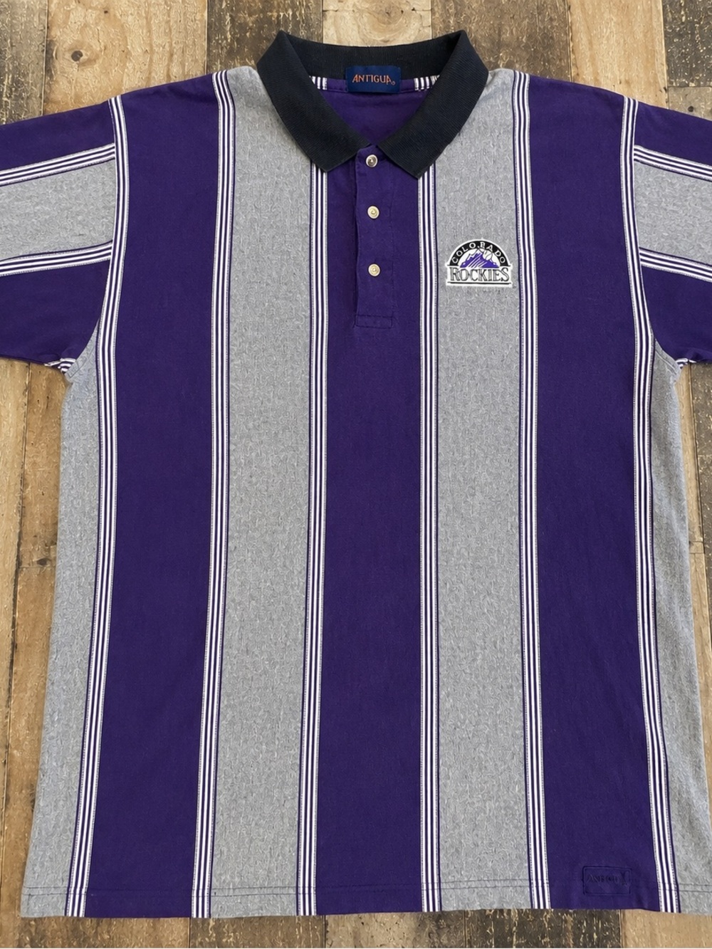 Antigua Colorado Rockies Purple and Gray Striped Polo with Black Collar